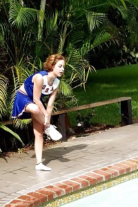 This Filthy Cheerleader Gets Dirty And Dives In A Swimming Pool Nude And Starts Touching Her Cunt In This Pics
