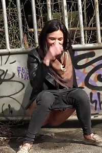 City Peeing For Seductive Black Haired Chick