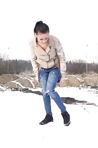 Magnificent Girl Squats In The Snow And Pisses Outside