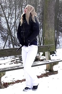 Lovely Sweetie Pissing Onto A Wooden Bench Outside