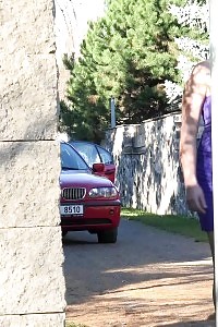 Black-haired Pissing As She Leans On A Wall