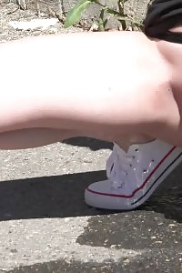 Tempting Brunette Squatting To Pee In The City