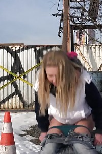 Violette Squats In The Snow To Piss Outdoors