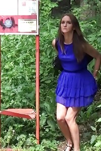 Black-haired Is Waiting For A Schoolbus And Needs To Piss