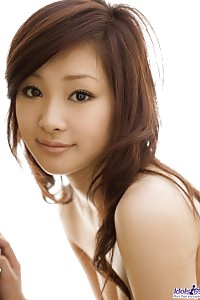 Breathtaking Asian Tigress Takes Off Her Cat Suit And Flaunts Her High Class Breasts